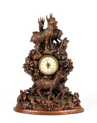 Lot 22 - BLACK FOREST CARVED MANTEL CLOCK