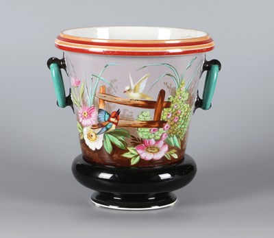 Lot 144 - Tweedelige cachepot met bloemen en vlinders, Petrus Regout