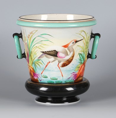 Lot 356 - Tweedelige cachepot met exotische vogel, Petrus Regout
