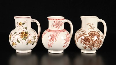 Lot 384 - Drie waterkannen met planten en bloemen, decor ‘Flower’ en ‘Begonia’, Petrus Regout