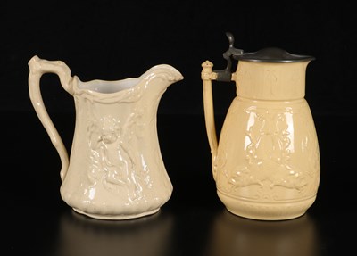Lot 396 - Twee roomkleurige kannen, Société Céramique en Petrus Regout