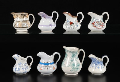 Lot 401 - Acht roomkannen met florale en vogeldecors, Petrus Regout