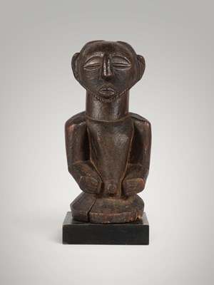Lot 56 - Kusu standing male figure.