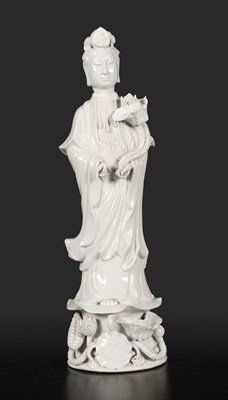 Lot 522 - Guanyin figure in white porcelain