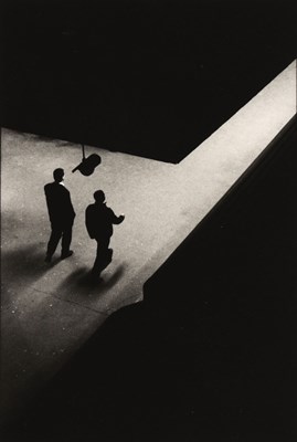 Lot 34 - Denis COHADON (1971) - Two Men Walking in Foyer.