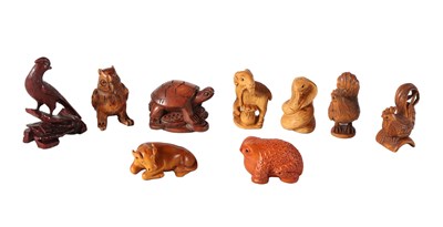 Lot 182 - Japan - 9 diverse houtgesneden "Netsuke's"