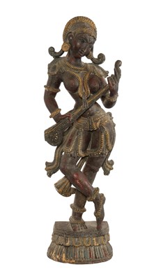 Lot 557 - Large polychrome wooden sculpture of the Goddess Saraswati