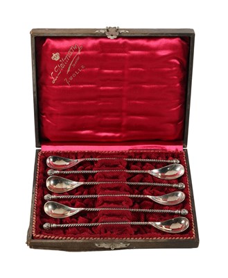 Lot 582 - Set of six silver gin and tonic spoons in presentation case
