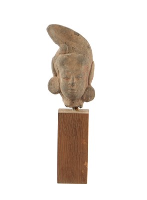 Lot 547 - A terracotta head of a deity, Majapahit, c. 1293–1527