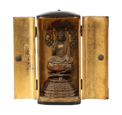 Lot 544 - A Japanese buddha in a shrine