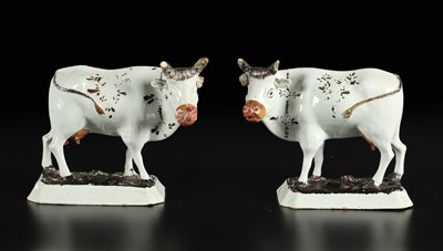 Lot 614 - Pair of 18th century white Delft cold-painted cows