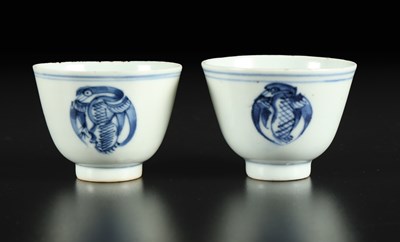 Lot 506 - A pair of blue and white ‘phoenix medallions’ porcelain cups
