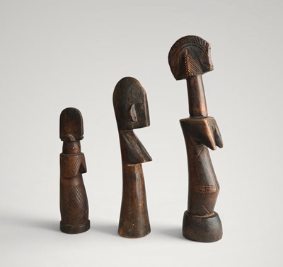 Lot 134 - Three Mossi fertility dolls.