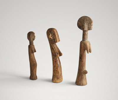 Lot 143 - Three Mossi fertility dolls.
