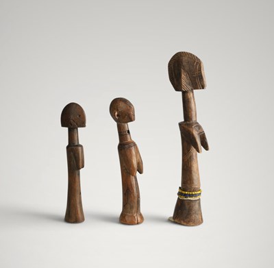 Lot 158 - Three Mossi fertility dolls.