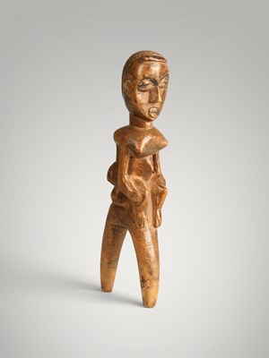 Lot 205 - Baoule catapult and amulet.