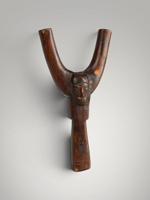 Lot 209 - Baoule catapult and amulet.