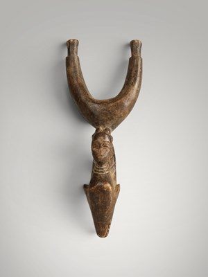 Lot 218 - Baoule catapult and amulet.