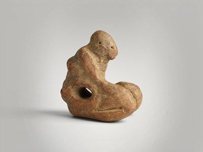 Lot 52 - Jenne-jeno terracotta amulet.