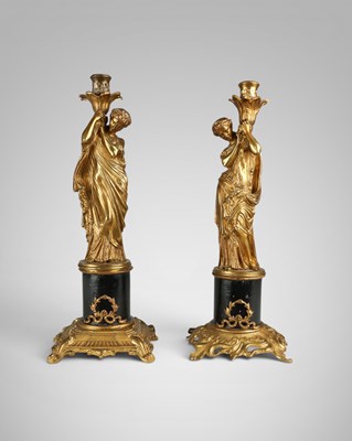 Lot 715 - Pair of French bronze figural candleholders