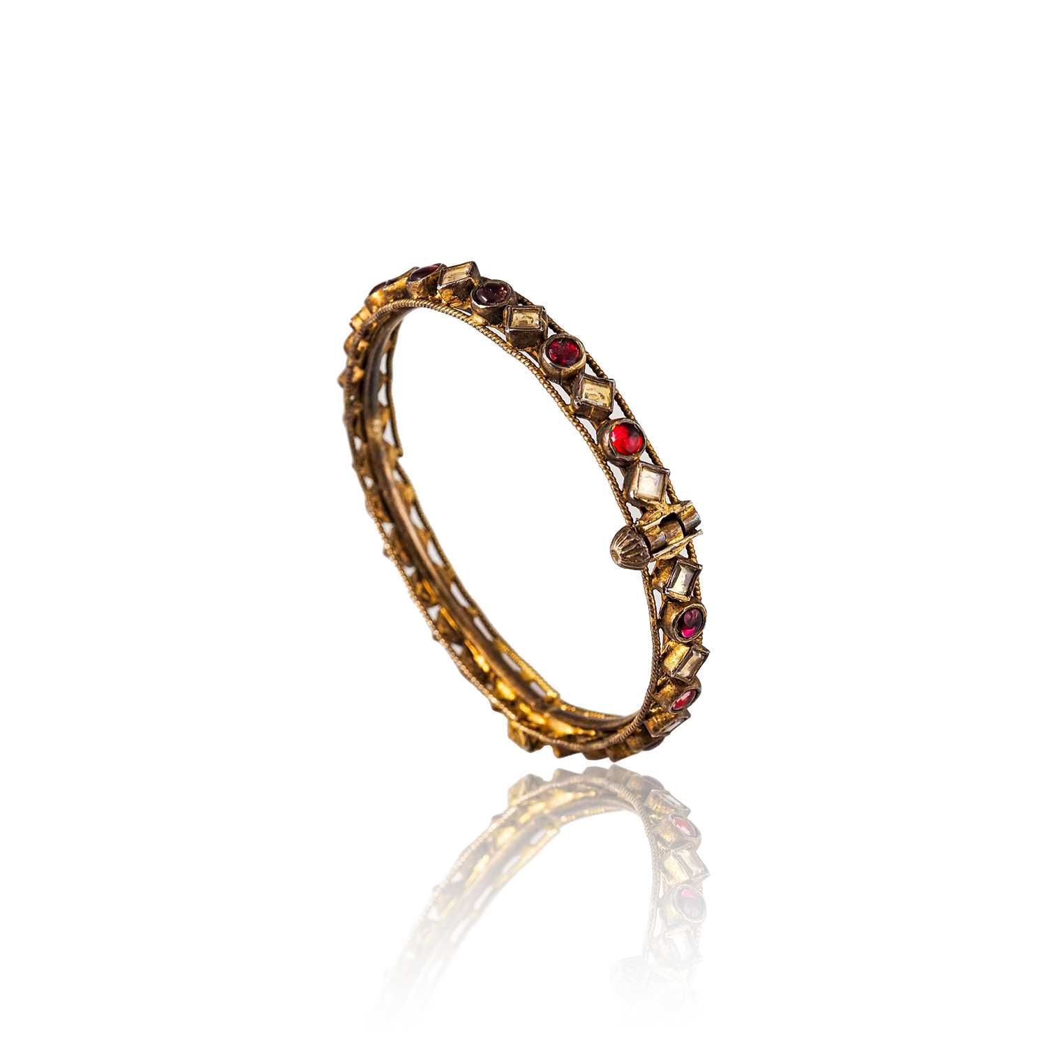 Lot 524 - A Mughal style Bracelet set with Tourmalines and Sapphires