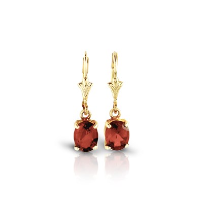Lot 404 - Pair of Gold Ear Pendants set with Garnet Solitaire