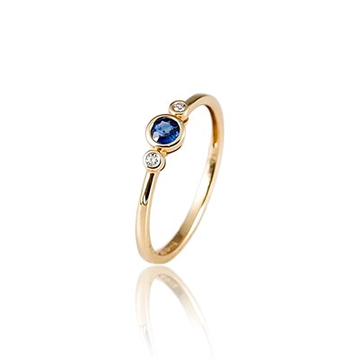 Lot 424 - White Gold Ring set with Diamonds and Sapphire Solitaire