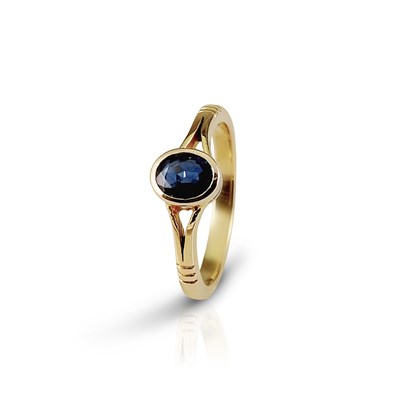 Lot 440 - Gold Ring set with Diamonds and Sapphire Solitaire