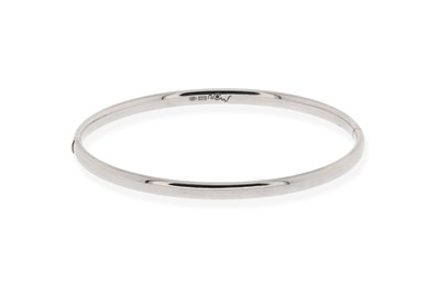 Lot 606 - Stiff White Gold Hinged Bracelet.