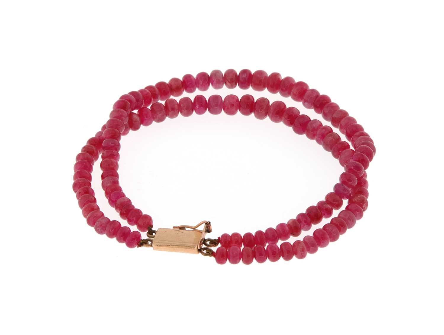 Lot 557 - 2-Strand Ruby Bracelet with 14K Gold Lock
