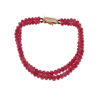 Lot 557 - 2-Strand Ruby Bracelet with 14K Gold Lock