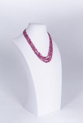 Lot 564 - 3-Strand Pink Sapphire Necklace with 14K Gold Lock