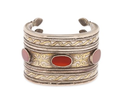 Lot 134 - A Fire-Gilded Silver and Carnelian ‘Bilezik’ Cuff Bracelet