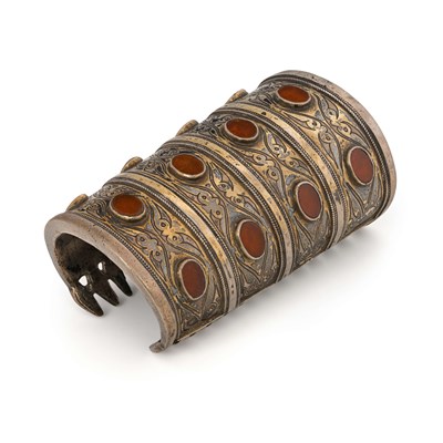Lot 139 - A Fire-Gilded Silver and Carnelian ‘Bilezik’ Cuff Bracelet.