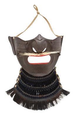 Lot 222 - A Black Iron Mempo, Japan, Edo Period, circa 1750