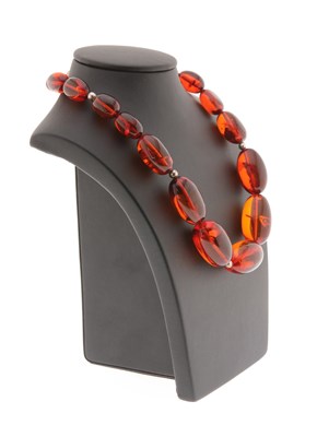 Lot 604 - Large Amber Necklace with Silver Lock