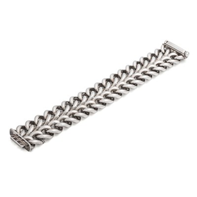 Lot 672 - Broad Silver Bracelet