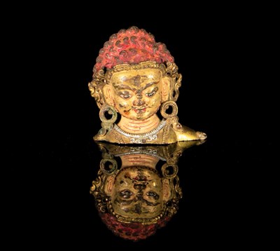 Lot 6 - A Gilt Bronze Head of Mahakala
