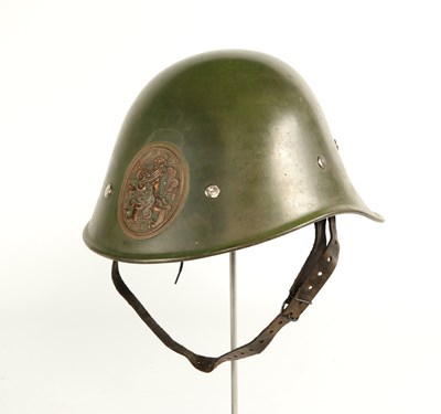 Lot 579 - Very rare Dutch cavalry leather helmet wearer, hereby a Dutch M34 combat Helmet