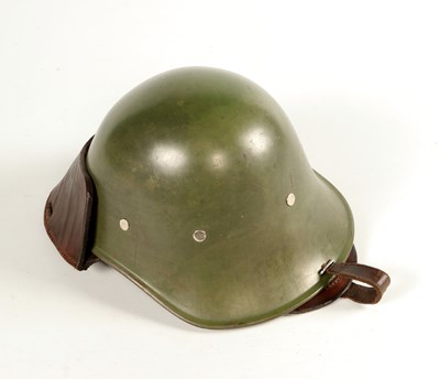 Lot 579 - Very rare Dutch cavalry leather helmet wearer, hereby a Dutch M34 combat Helmet