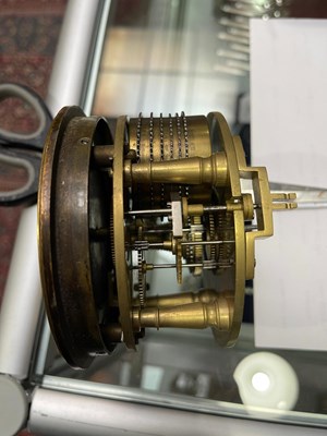 Lot 1141 - A wooden table clock with a brass dial