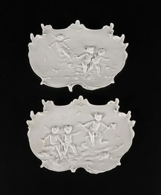 Lot 87 - Pair of Bisque Porcelain Plaques with Putti.