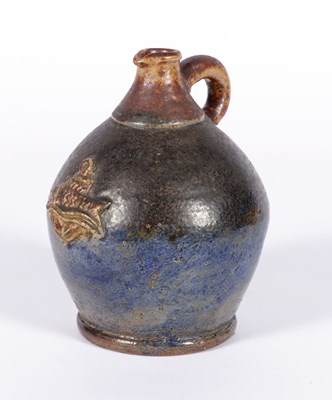 Lot 446 - Steengoed kruik met visdecoratie