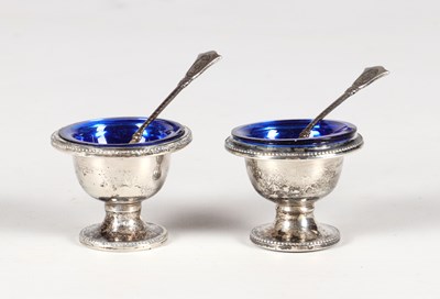 Lot 584 - Pair of silver salt cellars with blue glass liners